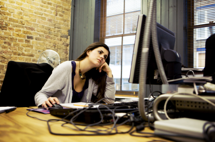 Magazine editor working at computer