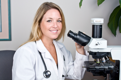 Pathologist using a microscope