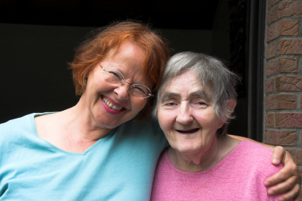 Elderly woman with social worker